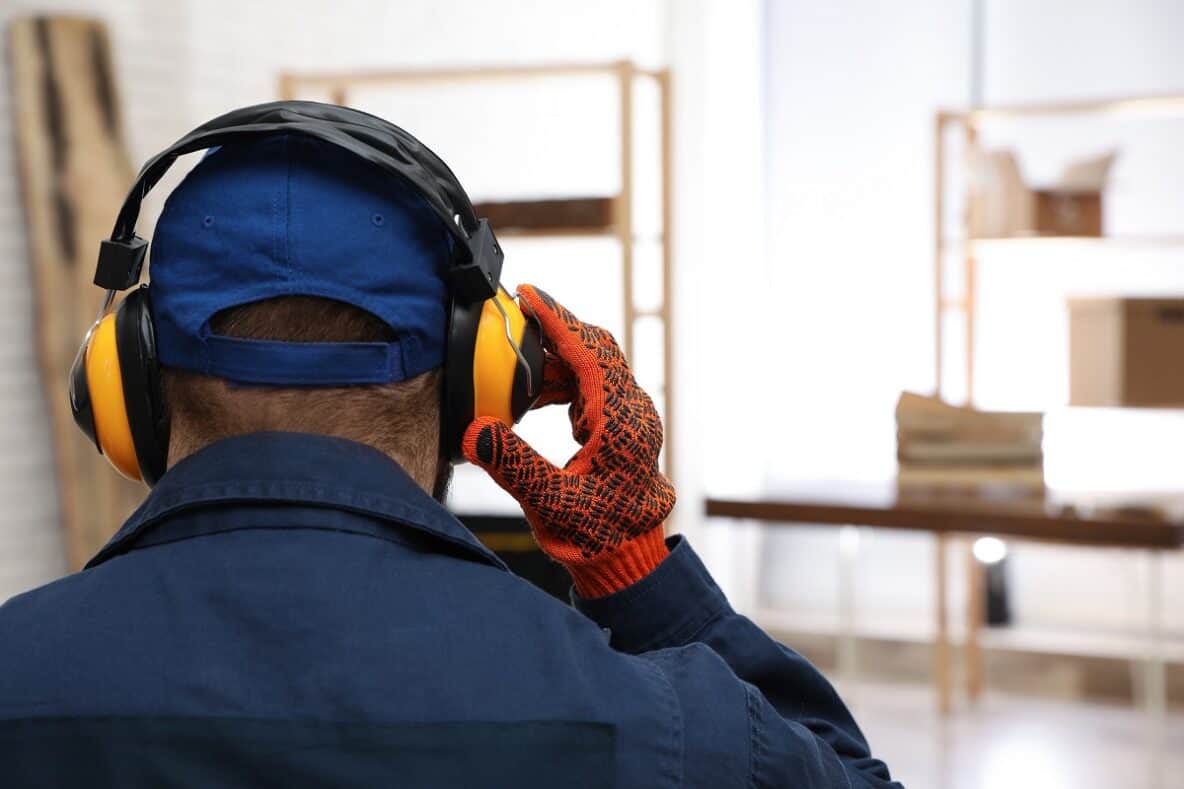 worker wearing hearing protective equiptment